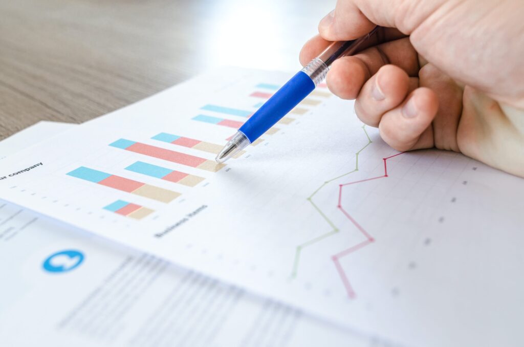 cash flow projections and charts on paper